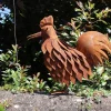 Coq en fer forgé rouillé