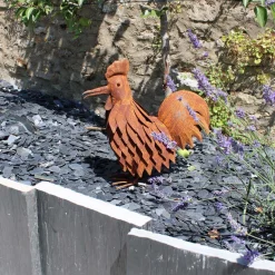 Coq en fer forgé rouillé
