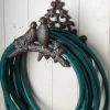 Porte tuyau fonte oiseaux