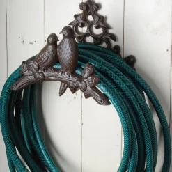 Porte tuyau fonte oiseaux