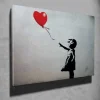 Toile décorative fille avec ballon 100 x 70 cm