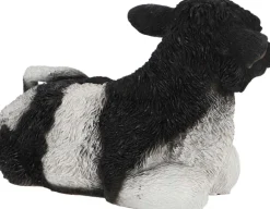 Veau noir et blanc couché en résine (Petit modèle)