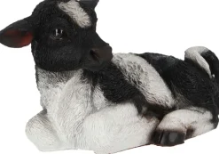 Veau noir et blanc couché en résine (Petit modèle)